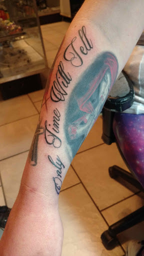 Explore mens infinity tattoo ideas, creative tattoo ideas in Espanola, available at Daydreamer Tattoo