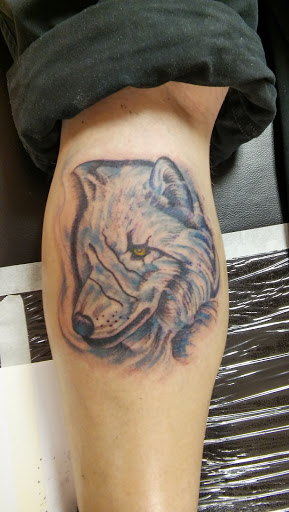Explore black male tattoo ideas, creative tattoo ideas in La Crosse, available at La Crosse Tattoo