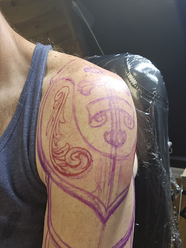 Explore tattoo of child's name ideas, creative tattoo ideas in Dayton, available at Cloak and Dagger Tattoo Studio