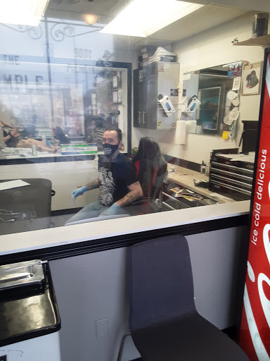 Explore tattoo ideas for breast cancer ribbon, creative tattoo ideas in Kalispell, available at The Temple Decor