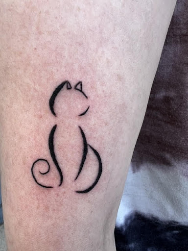 Find cool dog tattoo ideas for your next unique tattoo in Cheyenne at The T.R.I.B.E. Zoo, LLC Tattoo