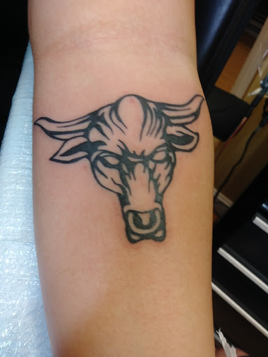 Explore trap tattoo ideas, creative tattoo ideas in Portsmouth, available at Grim North Tattoo and Piercing