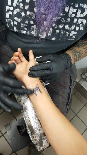 Explore cover up tattoo ideas leg, creative tattoo ideas in Huntsville, available at The Purple Goat Tattoos