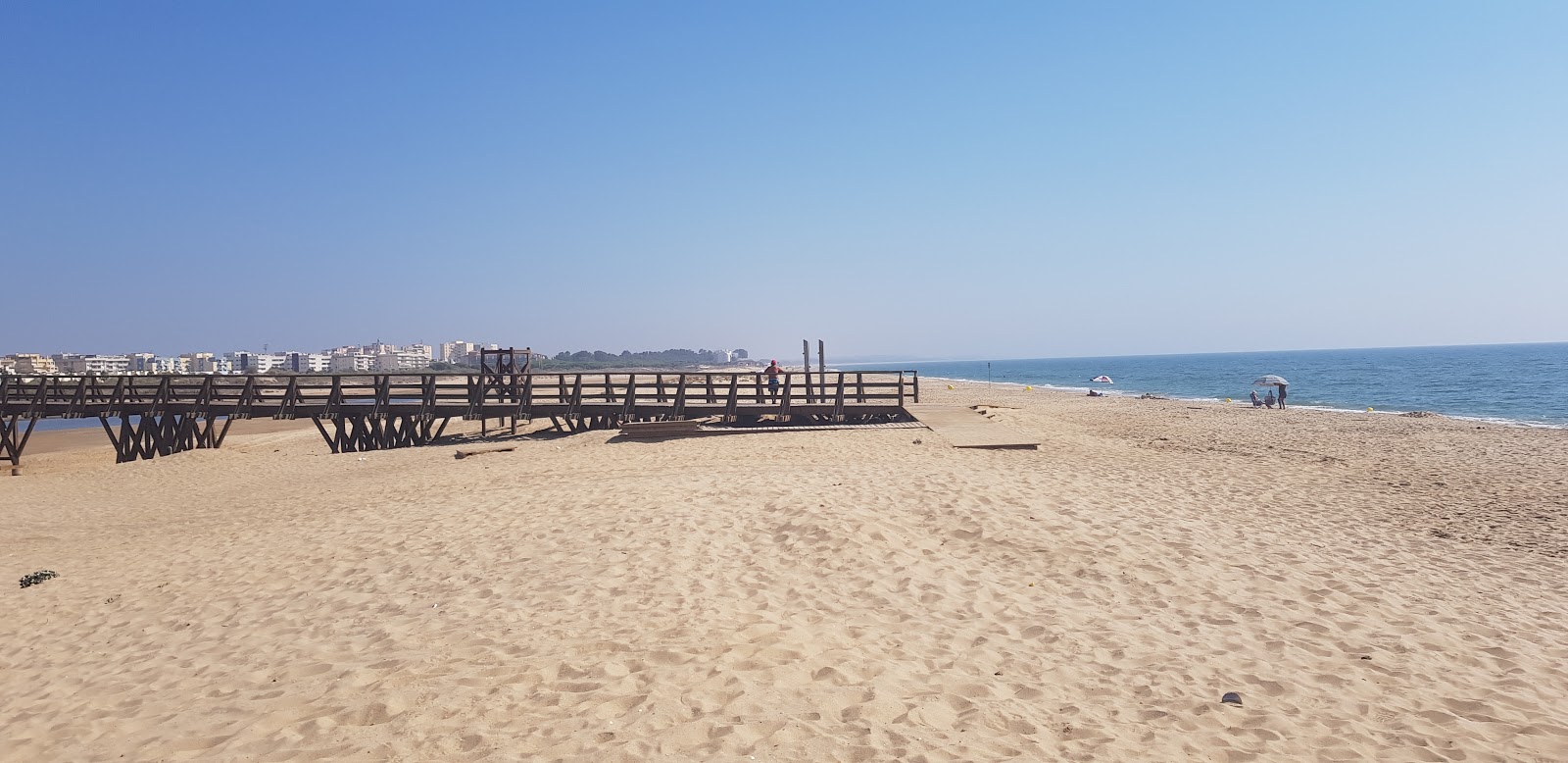 Foto de Playa del Vigia com areia brilhante superfície