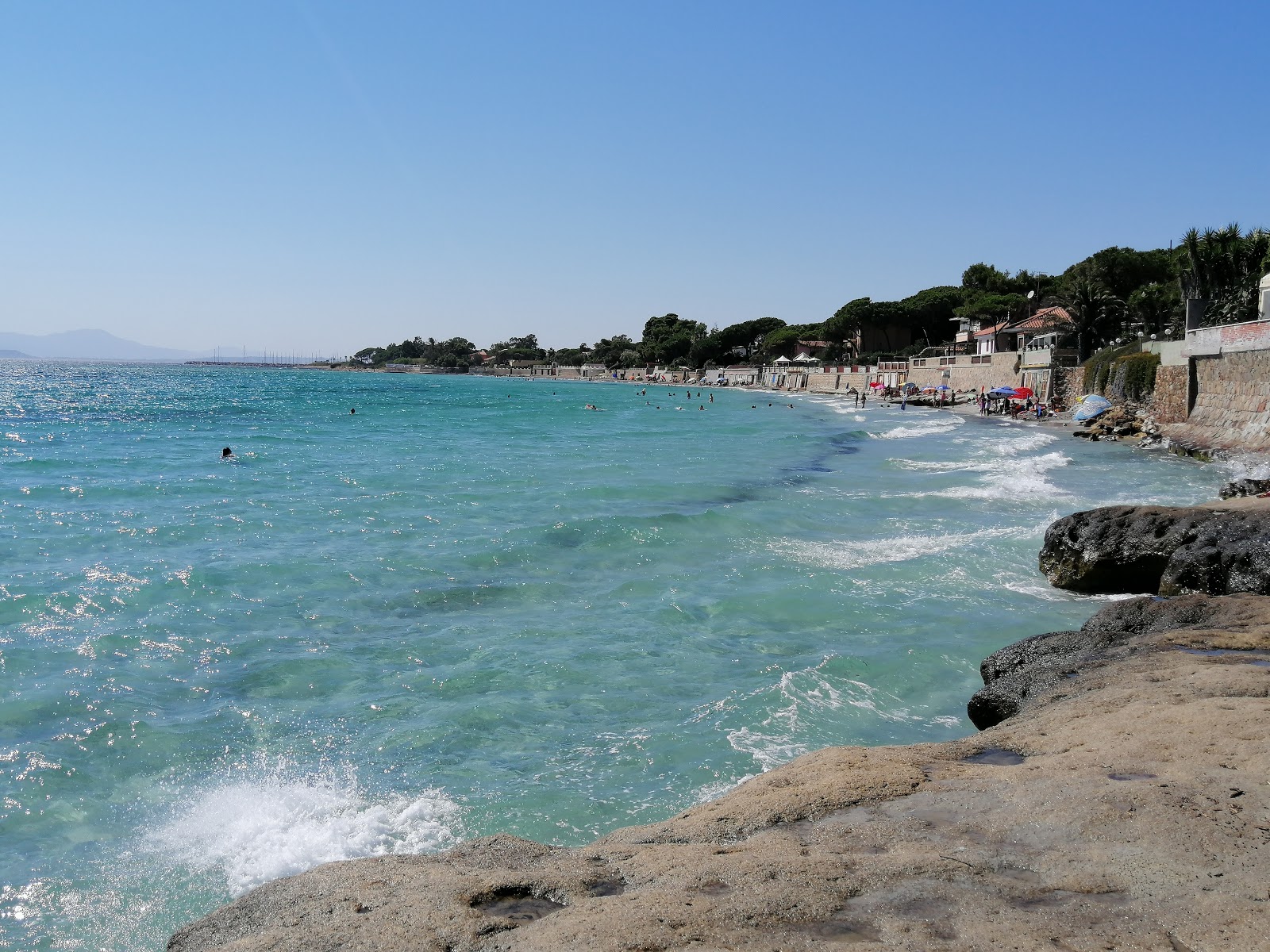 Foto van Spiaggia di Capitana en de nederzetting