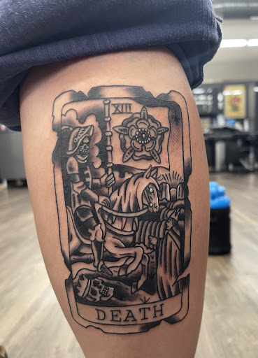Explore thigh hip tattoo ideas, creative tattoo ideas in Eau Claire, available at Gold Snake Tattoo
