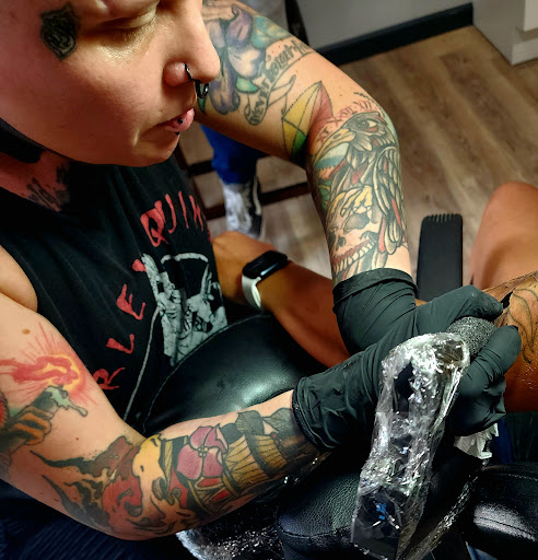 Explore angel neck tattoo ideas, creative tattoo ideas in Northfield, available at Signature Tattoo and Supplies