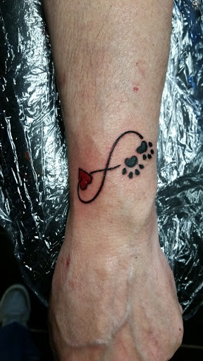 Explore trigun tattoo ideas, creative tattoo ideas in Erie, available at EliKingInk