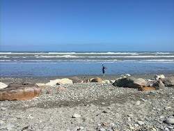 Foto di Rapahoe Bay Beach con una superficie del acqua turchese