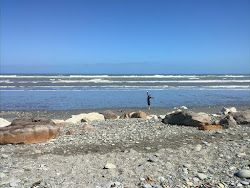 Rapahoe Bay Beach'in fotoğrafı geniş bir kıyı şeridi ile birlikte