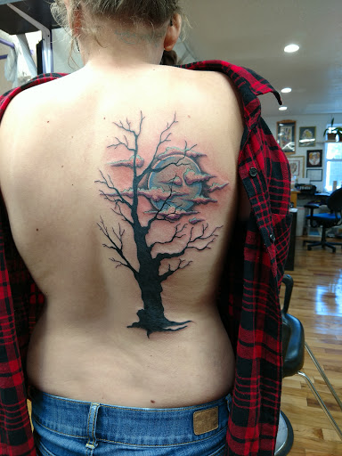 Explore womb tattoo ideas, creative tattoo ideas in Morristown, available at Ink Dreams Tattoo