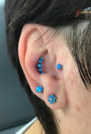 Explore tattoos of basketballs for ideas, creative tattoo ideas in Springfield, available at Body Piercing By Qui Qui