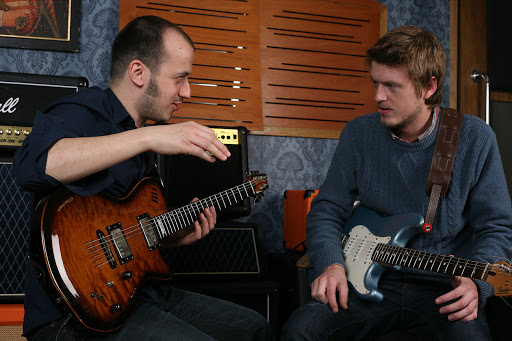 Gitarre bei Alex - Gitarrenunterricht bei Alex Root