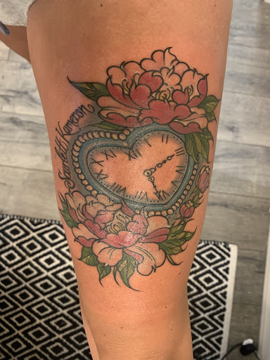Find tattoo ideas with roses for your next unique tattoo in Peoria at Iron Key Tattoo Studio Inc.
