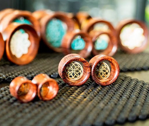 Explore tattoo for men ideas, creative tattoo ideas in Charleston, available at Exotic Impressions Body Piercing