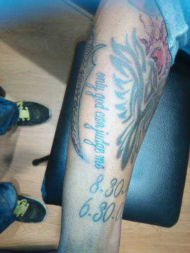 Explore boo tattoo ideas, creative tattoo ideas in La Crosse, available at La Crosse Tattoo