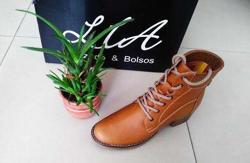 Stores to buy women's flat boots Bucaramanga