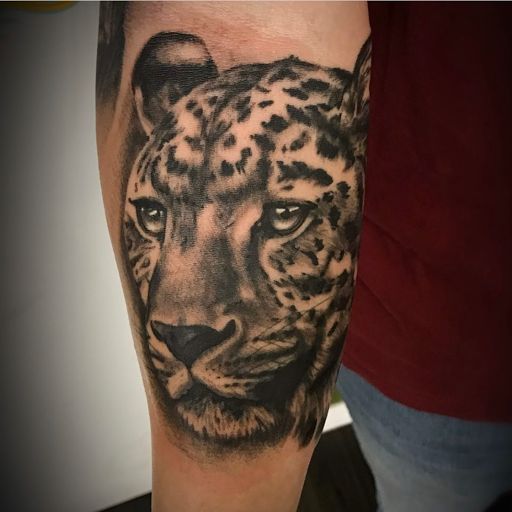 Explore tooled leather tattoo ideas, creative tattoo ideas in Twentynine Palms, available at Hilltop Tattoo Company