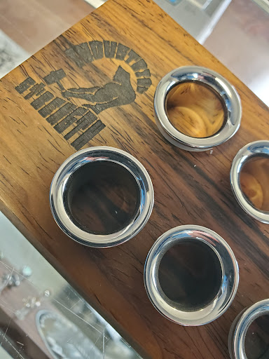 Explore nike tattoo ideas, creative tattoo ideas in Aurora, available at Skin of A Different Color