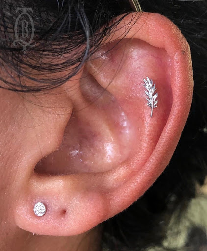 Explore small sleeve tattoo ideas, creative tattoo ideas in Marietta, available at The Queen Bee Tattoo and Piercing Parlour