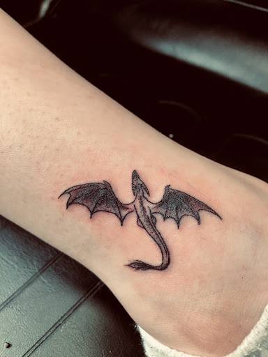 Explore tattoo arm ideas, creative tattoo ideas in North Tonawanda, available at Dark Side Ink Tattoo Studio