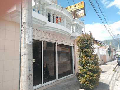 Restaurante Black&White - 9V28+77H, Dr. Juan José Páez, Ibarra, Ecuador