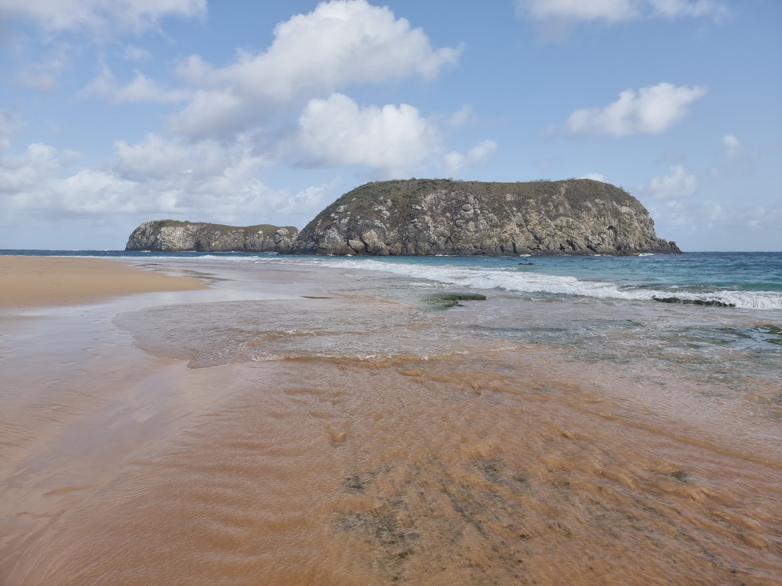 Fotografija Praia Do Leao z turkizna čista voda površino