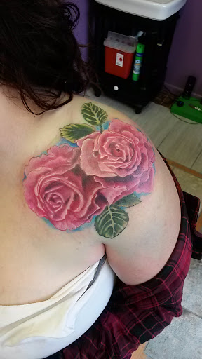 Explore galaxy tattoo ideas, creative tattoo ideas in Danbury, available at Luv Ink