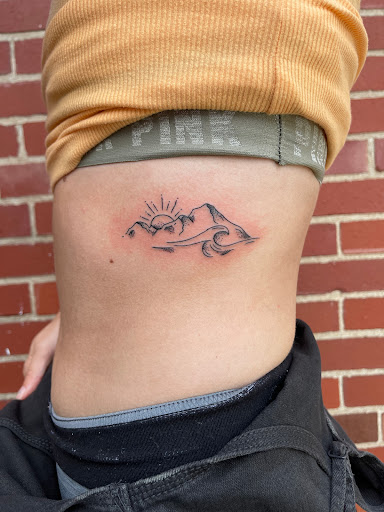 Explore hunting sleeve tattoo ideas, creative tattoo ideas in Strasburg, available at Champion Tattoo Company