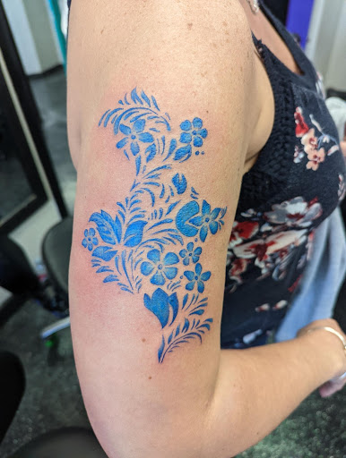 Explore song lyric tattoo ideas, creative tattoo ideas in Slippery Rock, available at Dinky Dachshund Tattoo Parlor