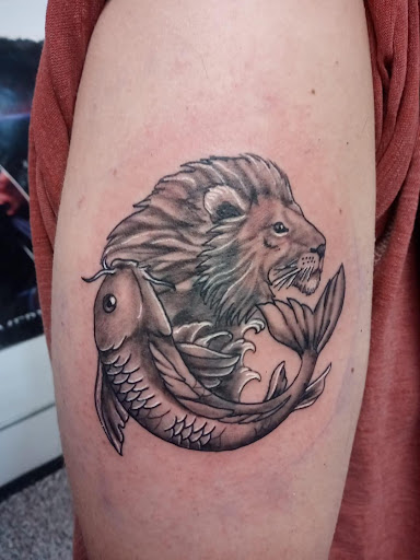 Explore back of thigh tattoo ideas, creative tattoo ideas in Rogers, available at Jimmy Romance Tattoo & Body Piercing