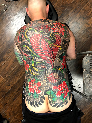 Explore inner bicep tattoo cover up ideas, creative tattoo ideas in Jacksonville, available at Idle Hands Tattoo Co.