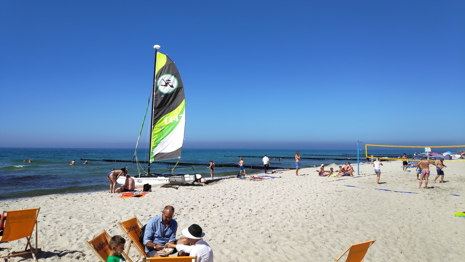 Foto von Markgrafenheide strand mit türkisfarbenes wasser Oberfläche