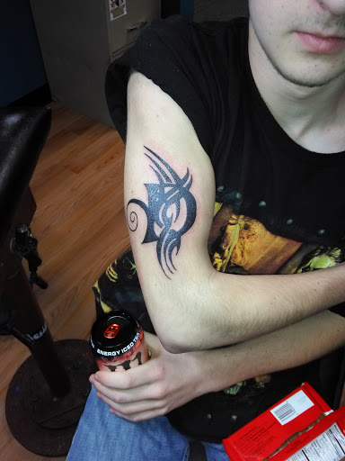 Explore flash tattoo ideas for guys, creative tattoo ideas in Youngstown, available at Twisted Metal Custom Body Art