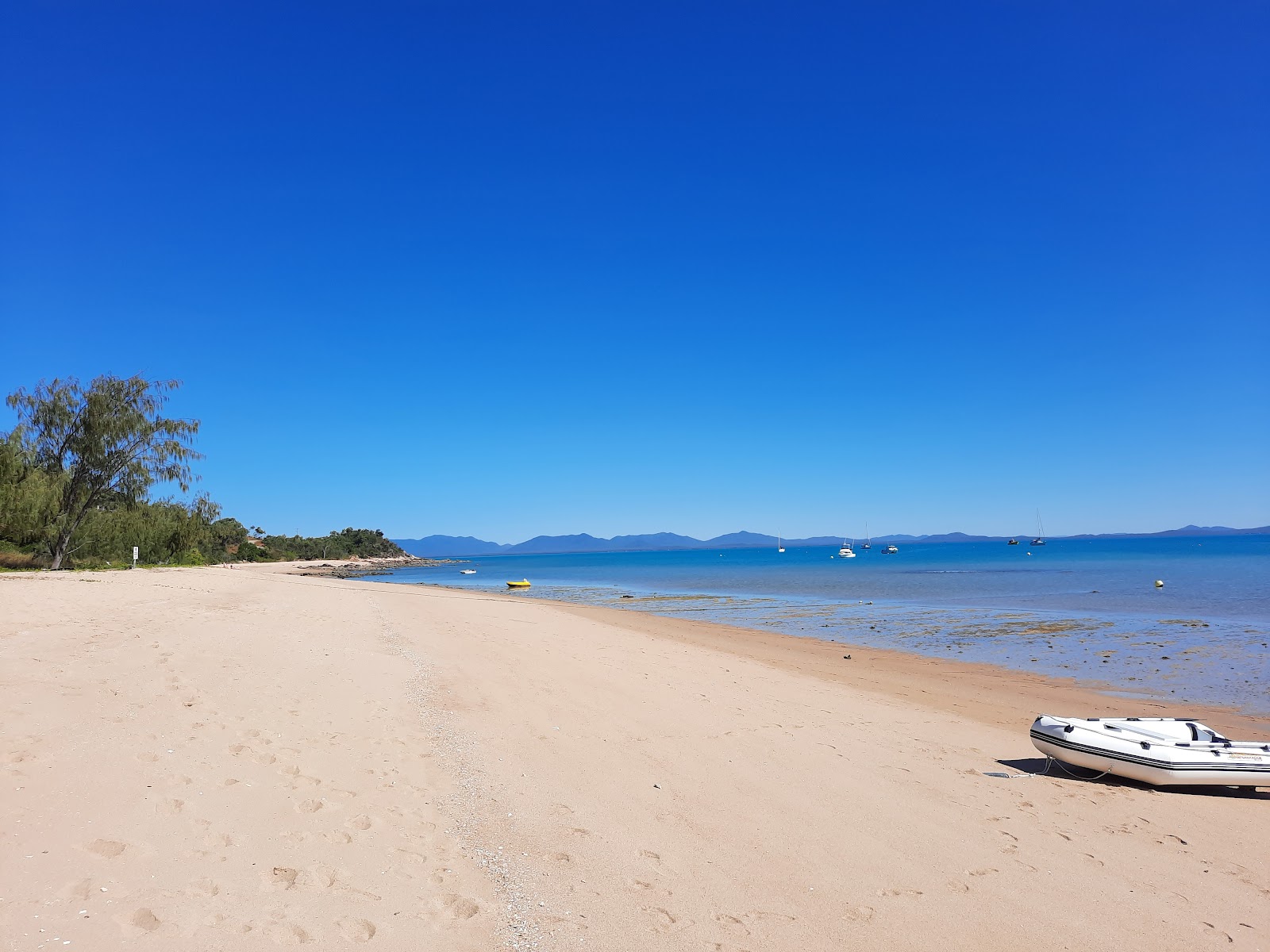 Foto von Passage Islet Reef Beach mit beiger sand Oberfläche