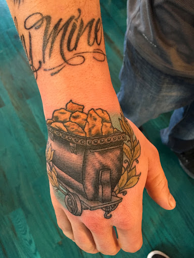 Explore witch hand tattoo ideas, creative tattoo ideas in Reno, available at Aces Tattoo