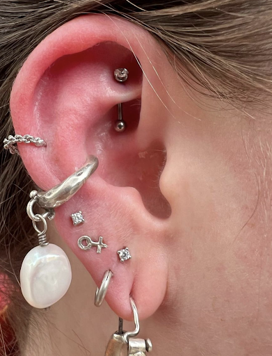 Explore snoopy tattoo ideas, creative tattoo ideas in New York, available at Cherry Bomb Tattoo & Piercing Studio - Walk-Ins Welcome