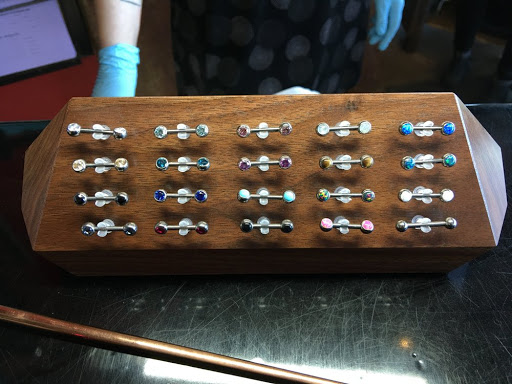 Explore thigh tattoos ideas for guys, creative tattoo ideas in Minneapolis, available at Leviticus Tattoo and Body Piercing