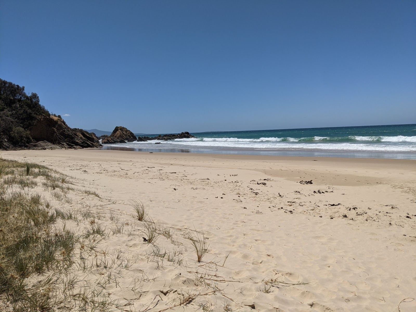 Foto di Secret Beach con una superficie del sabbia fine e luminosa