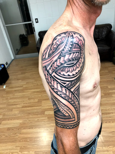 Explore whole back tattoo ideas, creative tattoo ideas in Sarasota, available at SEVEN SINS Tattoo Studio