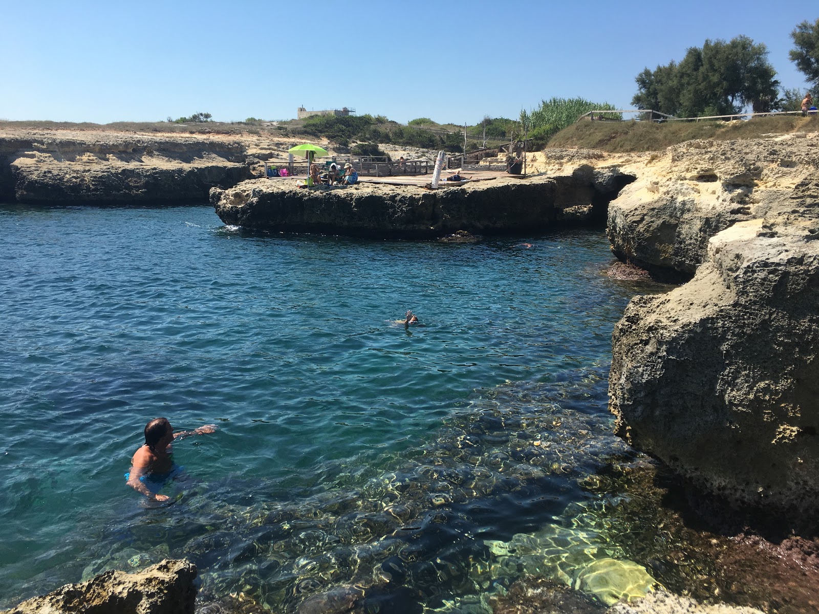 Foto di Cala di San Pietro dei Canali con una superficie del rocky shore
