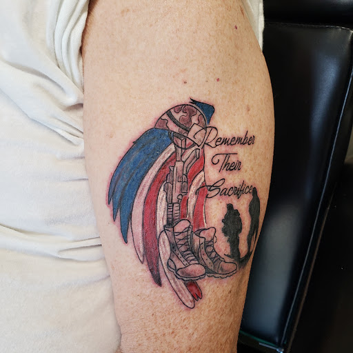 Explore front neck tattoo ideas, creative tattoo ideas in Traverse City, available at Pinups & Needles