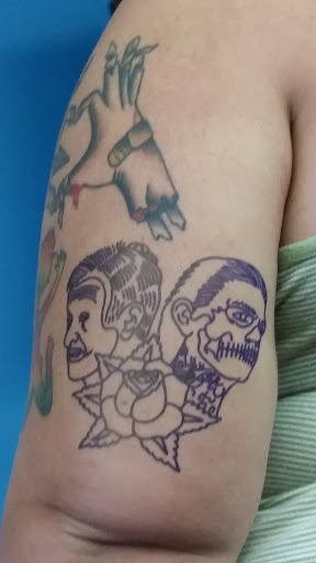 Find alpha and omega tattoo ideas for your next unique tattoo in Salem at State Street Tattoo