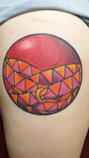 Explore tulip tattoo ideas, creative tattoo ideas in Cary, available at Double Deuce Tattoo and Art Gallery