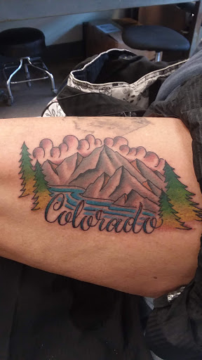 Explore stomach tattoo ideas for men, creative tattoo ideas in Denver, available at Denver City Tattoo Club