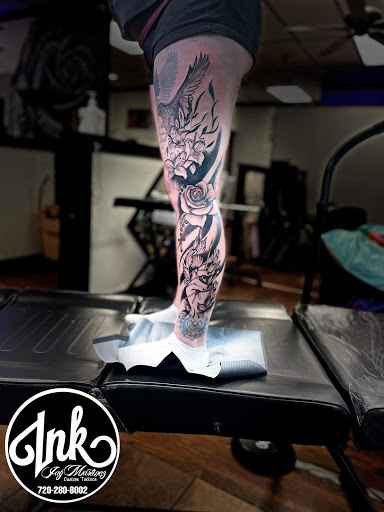 Explore cover up lower back tattoo ideas, creative tattoo ideas in Denver, available at 5280 INK