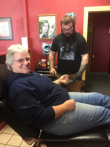 Explore stoner tattoo ideas, creative tattoo ideas in Cadillac, available at Darkside Studios