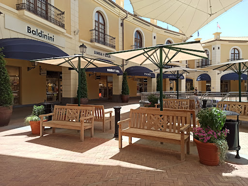 Tiendas para comprar bolsos adolfo dominguez Málaga