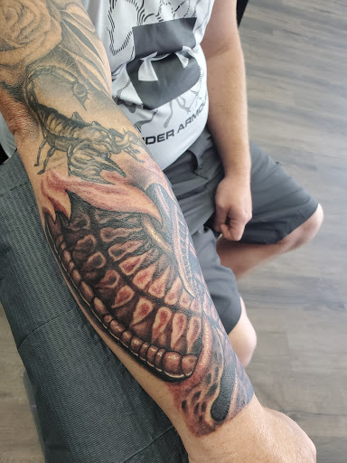 Explore patchwork tattoo ideas, creative tattoo ideas in Dayton, available at 33 Lions Tattoo