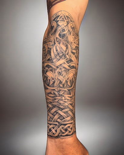 Explore mens neck tattoo ideas, creative tattoo ideas in Huntington, available at Timeless Tattoo Gallery